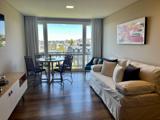 Alojamiento en el centro con vista parcial al lago y con cochera